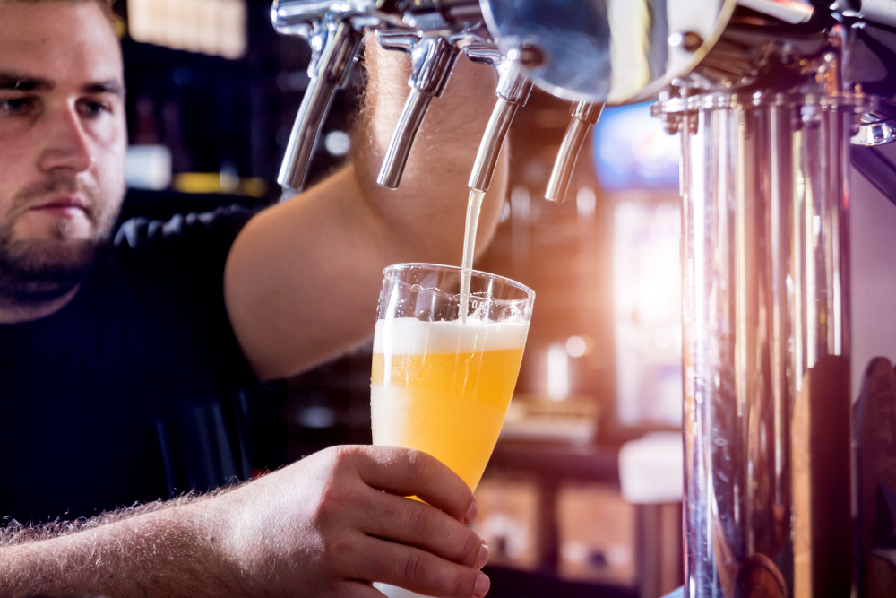 An image of an A Head for Profits technician doing some draft beer system troubleshooting