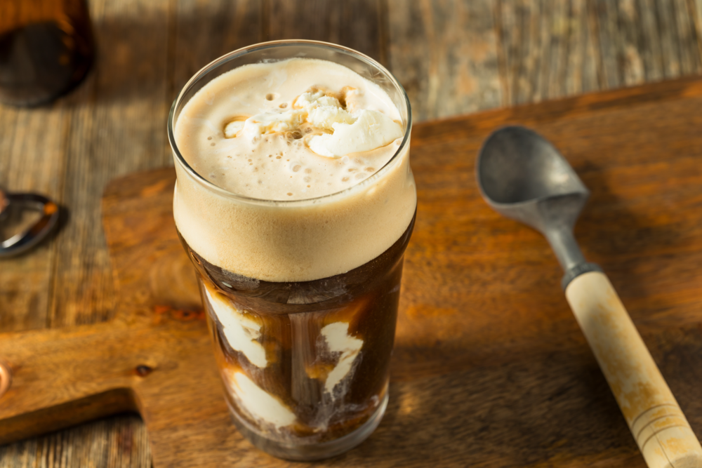 A photo of a beer and ice cream float